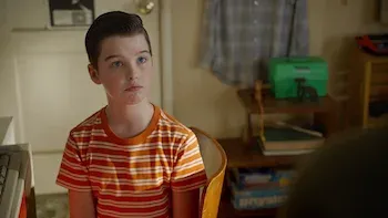 Una mala racha, una cruz y grava de la carretera