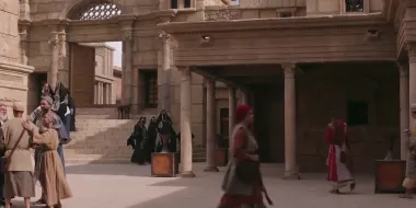 Sentarse, servir, maquinar